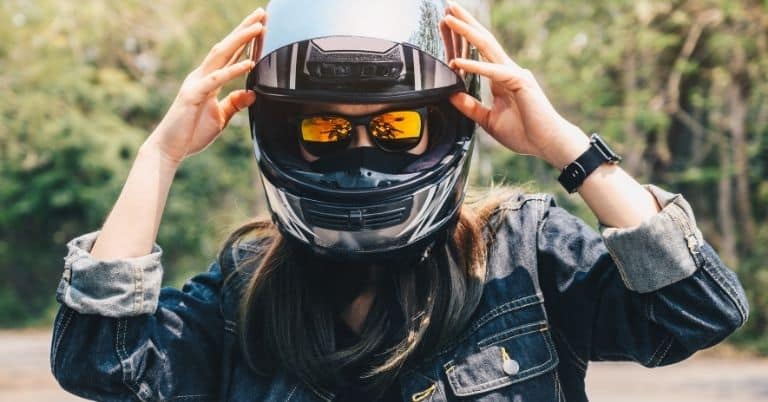woman wearing motorcycle helmet