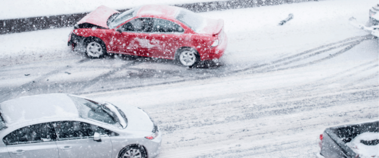 Image of a car crashing on a snowy road